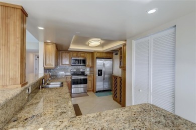 Move-in ready and filled with natural light, this stunning condo