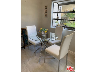 Beautiful, bright, remodeled one-bedroom, two-bath condo