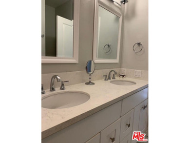 Beautiful, bright, remodeled one-bedroom, two-bath condo