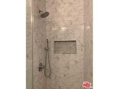 Beautiful, bright, remodeled one-bedroom, two-bath condo