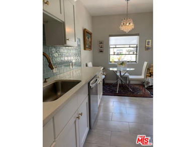 Beautiful, bright, remodeled one-bedroom, two-bath condo