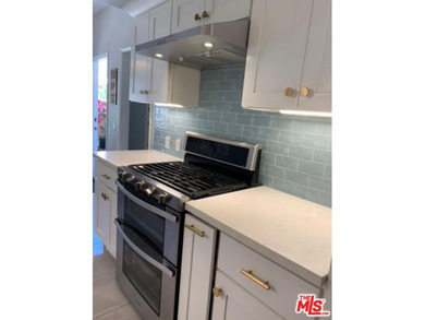 Beautiful, bright, remodeled one-bedroom, two-bath condo