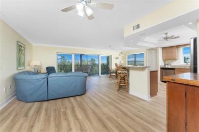 Experience the elegance of waterfront living in this stunning 3