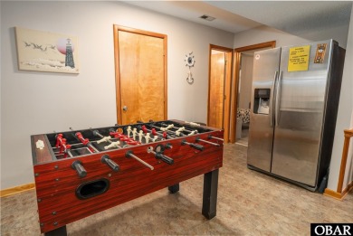 This home, located in Whalehead features a versatile layout