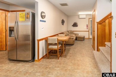 This home, located in Whalehead features a versatile layout