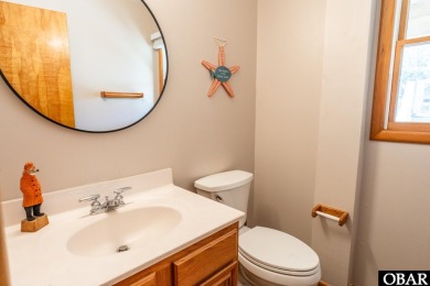 This home, located in Whalehead features a versatile layout