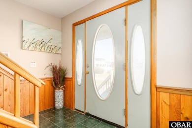 This home, located in Whalehead features a versatile layout