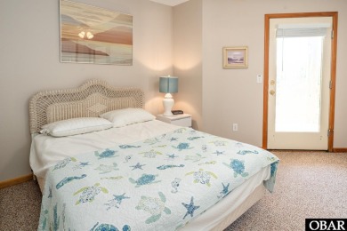 This home, located in Whalehead features a versatile layout