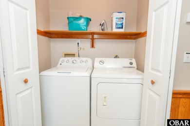 This home, located in Whalehead features a versatile layout