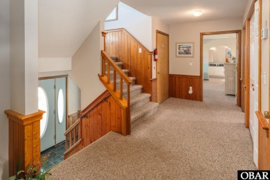 This home, located in Whalehead features a versatile layout