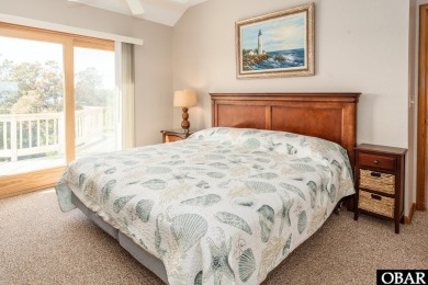 This home, located in Whalehead features a versatile layout