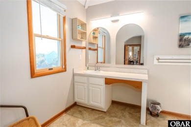 This home, located in Whalehead features a versatile layout