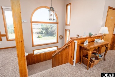 This home, located in Whalehead features a versatile layout