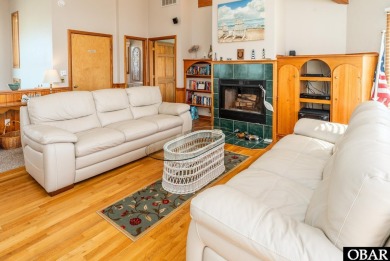 This home, located in Whalehead features a versatile layout