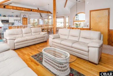 This home, located in Whalehead features a versatile layout