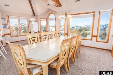 This home, located in Whalehead features a versatile layout