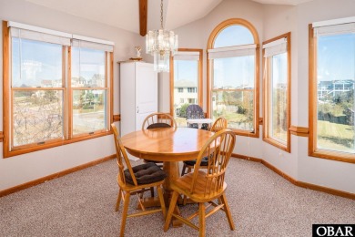 This home, located in Whalehead features a versatile layout