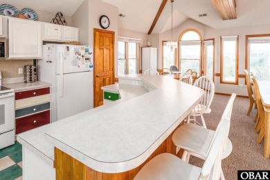 This home, located in Whalehead features a versatile layout