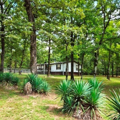 CUTE 3/2 DOUBLEWIDE ON 2 LOTS ON A CORNER WITH LOTS OF MATURE