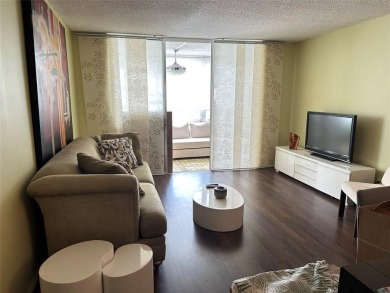 This fully furnished condo unit offers a comfortable and