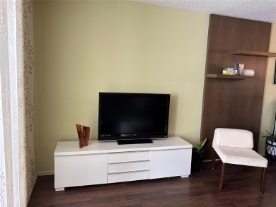 This fully furnished condo unit offers a comfortable and