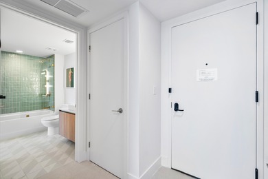 By combining the local atmosphere of a homestay with the service