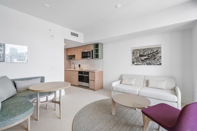 By combining the local atmosphere of a homestay with the service