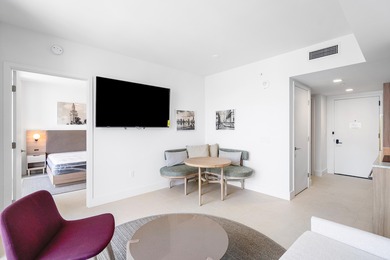 By combining the local atmosphere of a homestay with the service