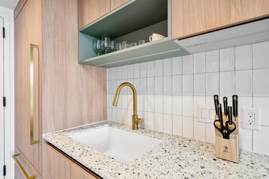 By combining the local atmosphere of a homestay with the service