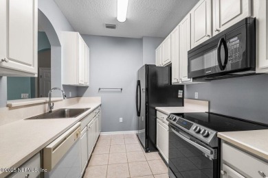 Welcome to this beautifully maintained 2-bedroom, 2-bath condo