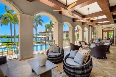 Experience unrivaled waterfront luxury at 210 Palm Avenue, a