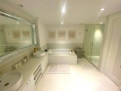 Magnificent 3 bedrooms, 3.5 baths, plus Den, ocean front