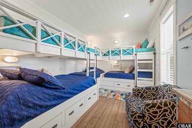 Welcome to this extraordinary 12-bedroom, 10.5-bath custom-built