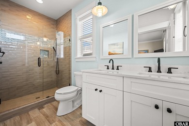 Welcome to this extraordinary 12-bedroom, 10.5-bath custom-built