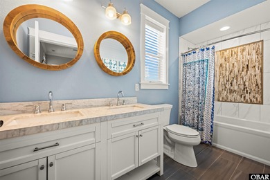 Welcome to this extraordinary 12-bedroom, 10.5-bath custom-built