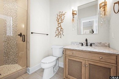 Welcome to this extraordinary 12-bedroom, 10.5-bath custom-built