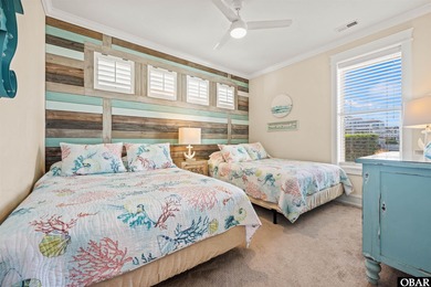 Welcome to this extraordinary 12-bedroom, 10.5-bath custom-built