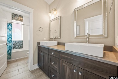 Welcome to this extraordinary 12-bedroom, 10.5-bath custom-built