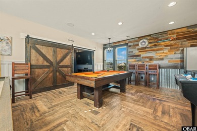 Welcome to this extraordinary 12-bedroom, 10.5-bath custom-built