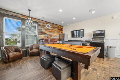 Welcome to this extraordinary 12-bedroom, 10.5-bath custom-built