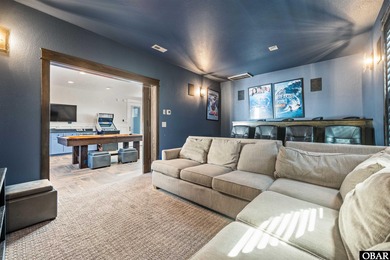 Welcome to this extraordinary 12-bedroom, 10.5-bath custom-built