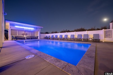 Welcome to this extraordinary 12-bedroom, 10.5-bath custom-built