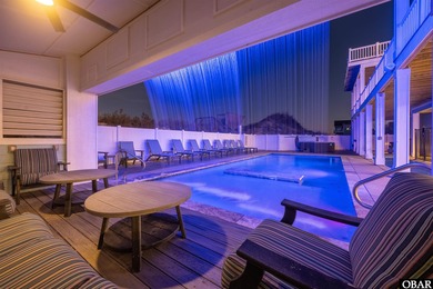 Welcome to this extraordinary 12-bedroom, 10.5-bath custom-built