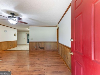 Welcome to Your New Lake Home! Discover this charming North Hall