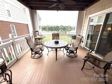 Enjoy lake living in this Spinnaker Point end unit condo on Lake