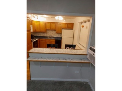 Welcome to this Top Floor Corner End Unit (No neighbors on