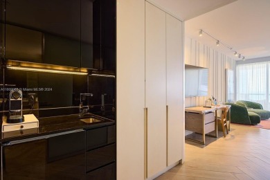 Welcome to 2201 Collins Avenue, Unit 1718, a luxurious studio