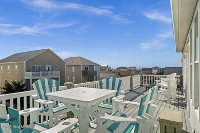 Welcome to your coastal retreat! This bright and inviting 5