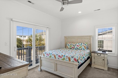 Welcome to your coastal retreat! This bright and inviting 5