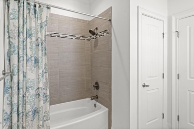 Welcome to your coastal retreat! This bright and inviting 5